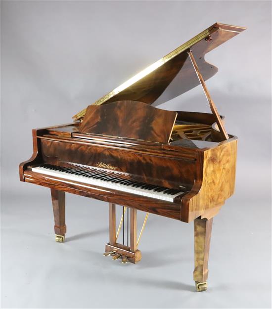 A Bluthner Model 6 flame mahogany cased grand piano, W.4ft 10in. L.6ft 3in. H.3ft 3in.